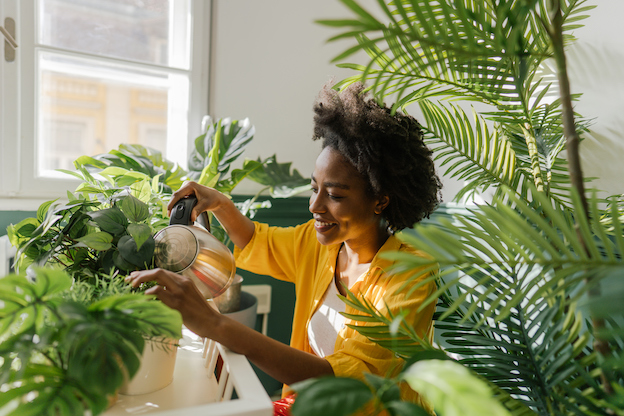 a women watering plants